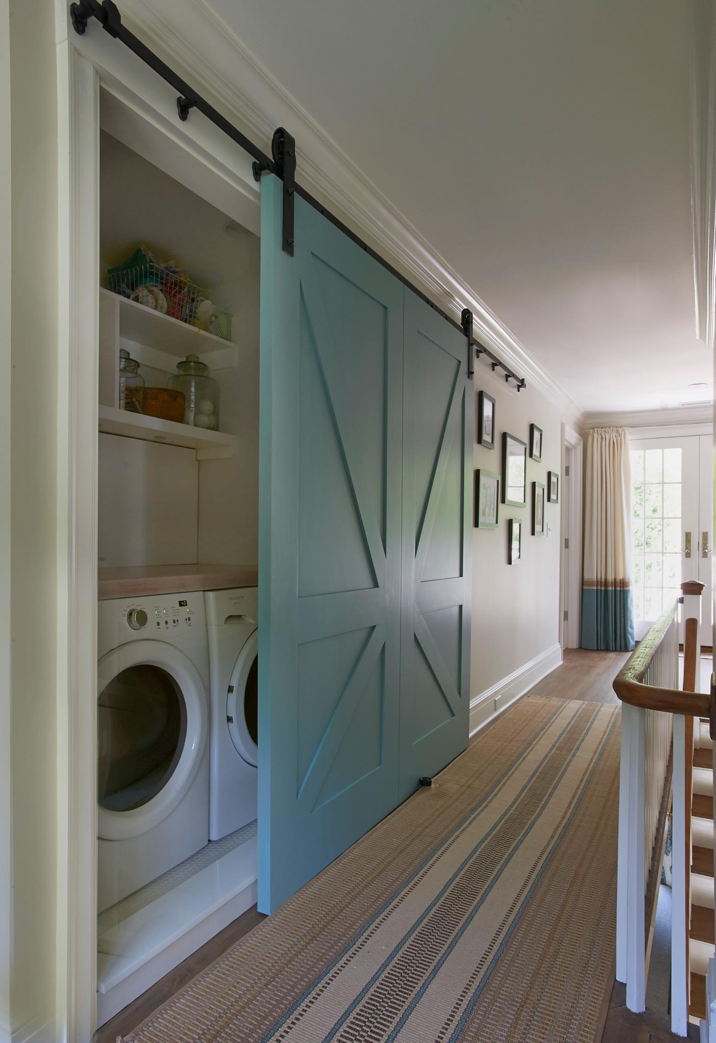 Great Space saving solution and I love the barn door,
Just to bad that there is no room for a stylish farmhouse laundry room sink