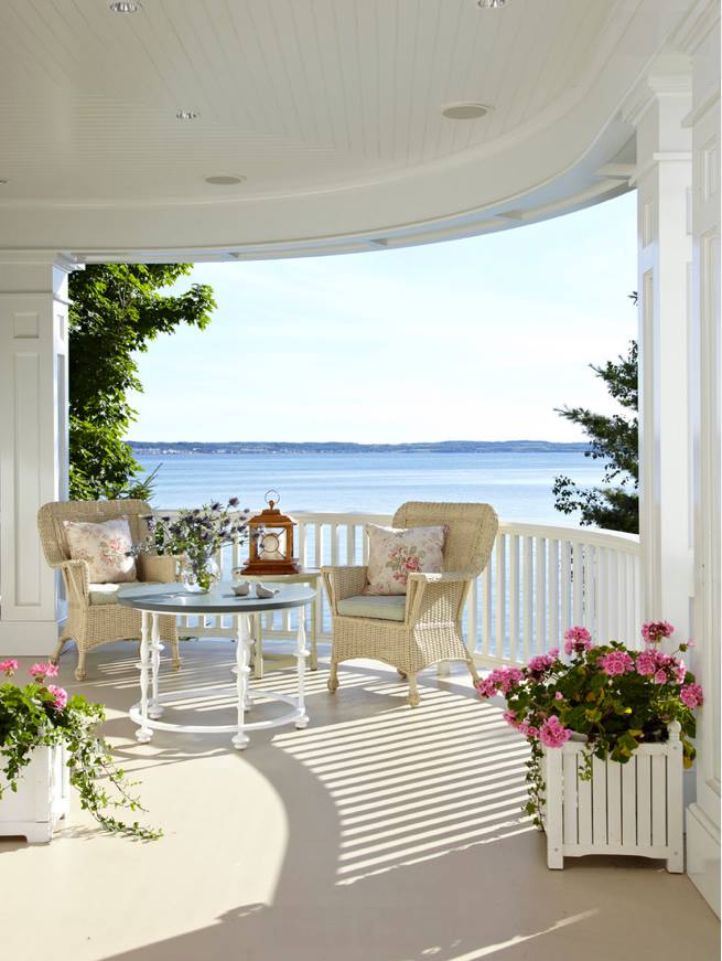 South Beach, cushy and rich looking wicker Patio furniture with large rounded arms and pillows bottom and back to sink down and relax i