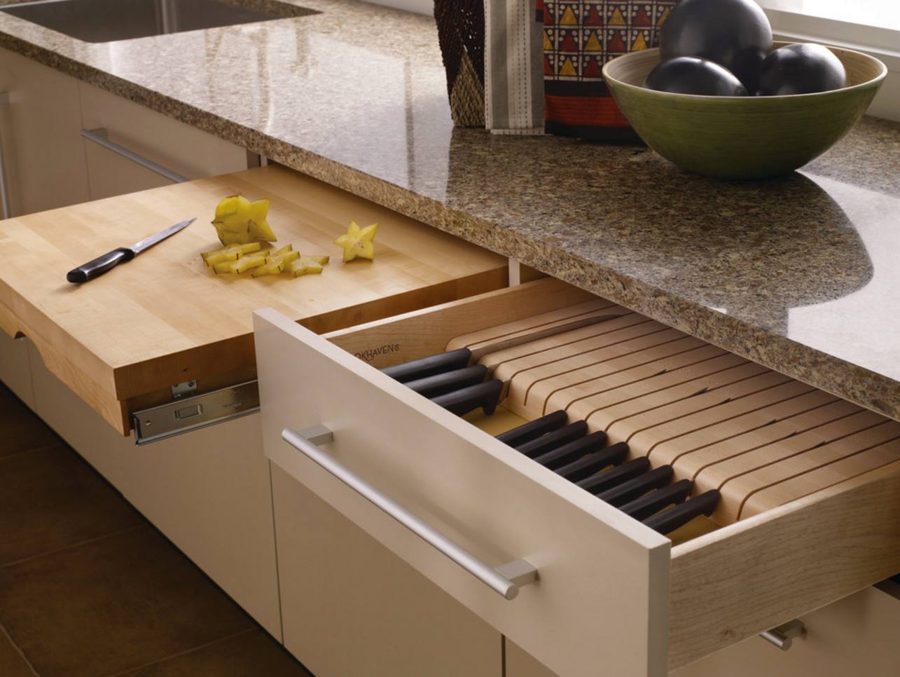 Kitchen Hack -- Above you can see the Cutting Board and Knife Drawer.