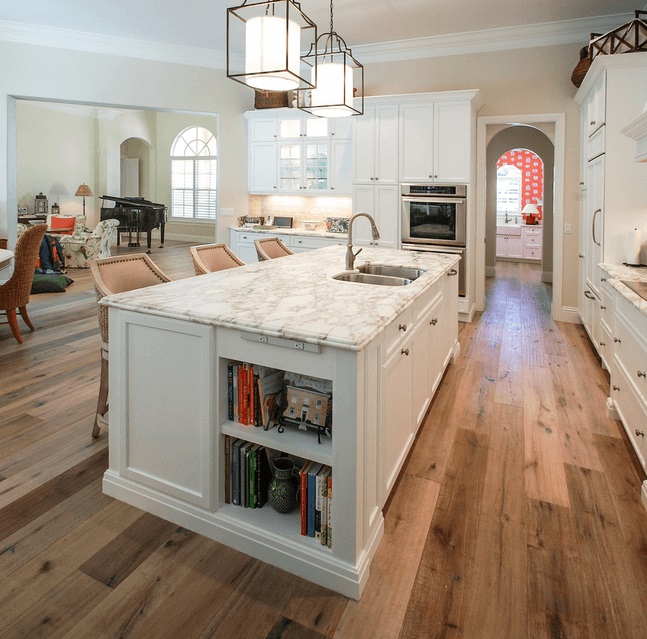 This Island with its classic Marble top looks very elegant too bad we can't see these great kitchens with Island bar-chairs