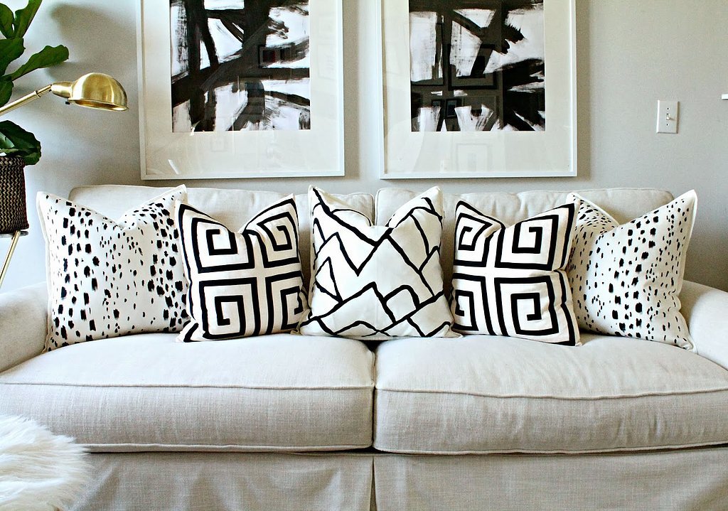 Hand painted pillow casings for a personal note on the love seat