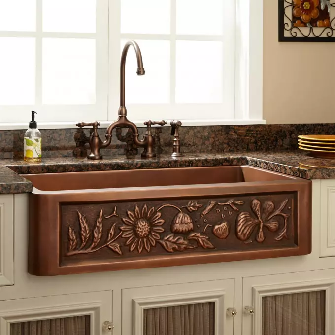 farmhouse kitchen sink
Material: Copper
Basin Split: Single
Apron Design: Floral
Faucet Centers: No Faucet Hole
Number of Basins: 1
Product Color: Antique Copper
Length: 33"
Width: 22"
Height: 9-1/2"
Basin Length: 30-3/4"
Basin Width: 18-3/8"
Water Depth to Rim: 8-3/4"
Apron Front Rim Thickness: 2-1/2"
Side and Back Rim Thickness: 1-1/8"
Metal Gauge/Thickness: 16 Gauge
Faucet Included: No
Faucet Holes: No Faucet Hole
Drain Included: Optional
Fits Drain Hole Size: 3-1/2"
Exterior Treatment: Embossed
Interior Treatment: Smooth