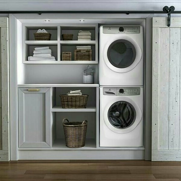 Clean and simple hide away laundry area.