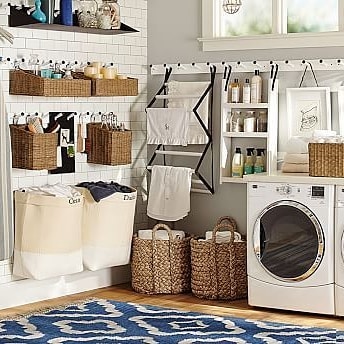 Nice farmhouse laundry room with Lots of great storage ideas