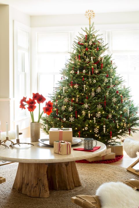 Swedish birch and felt ornaments supplied by Cose Nuove trim this tree.