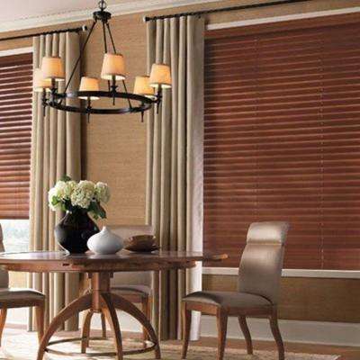 Both value & premium wood blinds are made of real woods. The value wood blind louvers are made of assorted Oriental hardwoods. The premium wood blind slats are manufactured from American Basswood. Basswood is a unique cross grained wood, containing rich detail and is naturally resistant against warping.