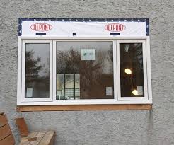 window replacement on stucco facade