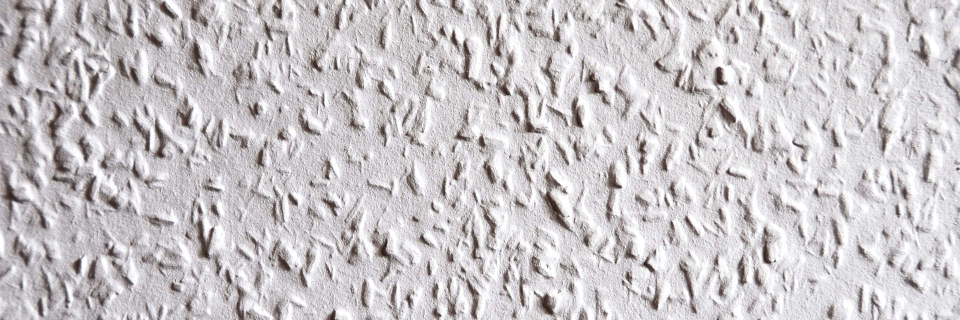 In Germany, we used this wallpaper as new layer before we painted the walls or ceiling. It is a plain paper wallpaper and came in various grit,
