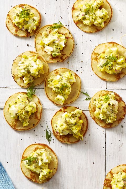 Egg Salad Blini BitesIf you're tired of deviled eggs (um, how...), then consider spooning homemade egg salad on mini pancakes for a party-ready appetizer.