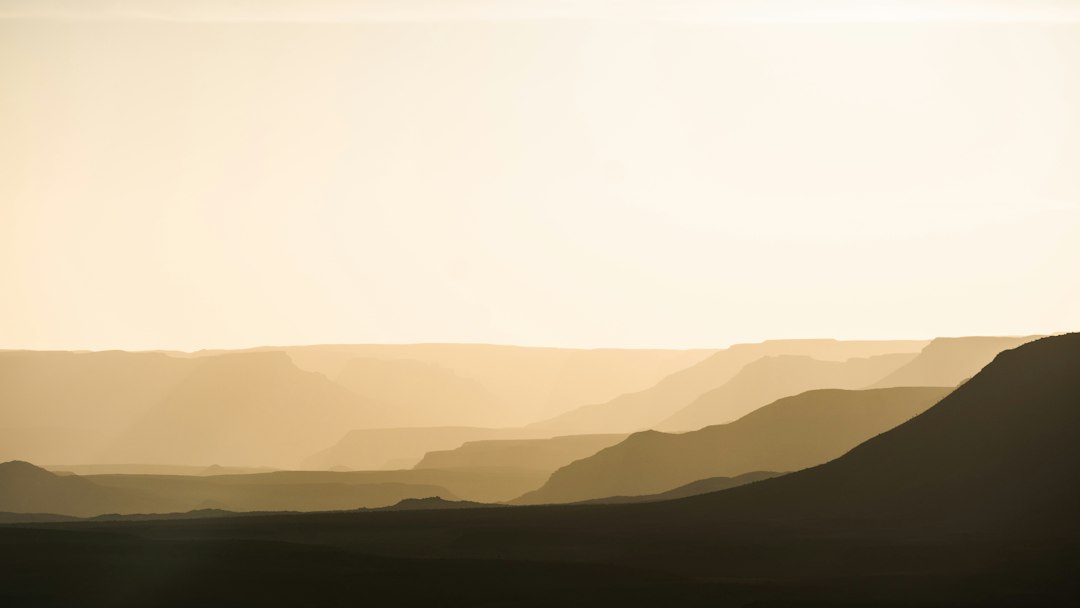 mountains under white clouds