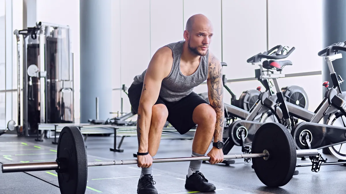 Rutina de gimnasio 4 días para hombres de 40: guía basada en evidencia