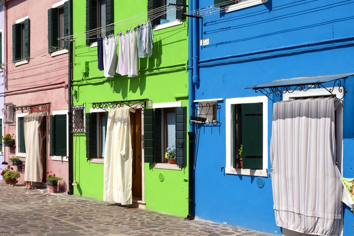 Guatape colorful zocalos facades village streets Colombia