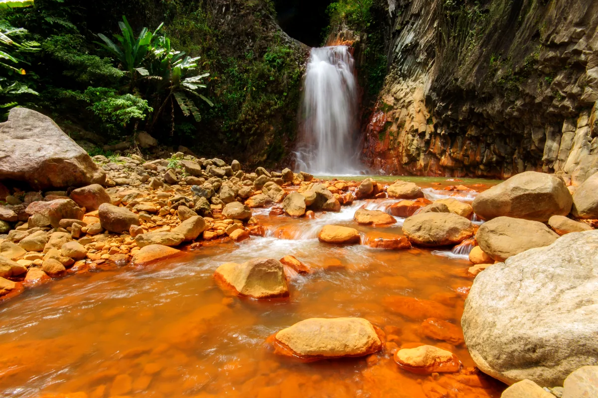 Caño Cristales river natural pools rocks multicolor water Colombia