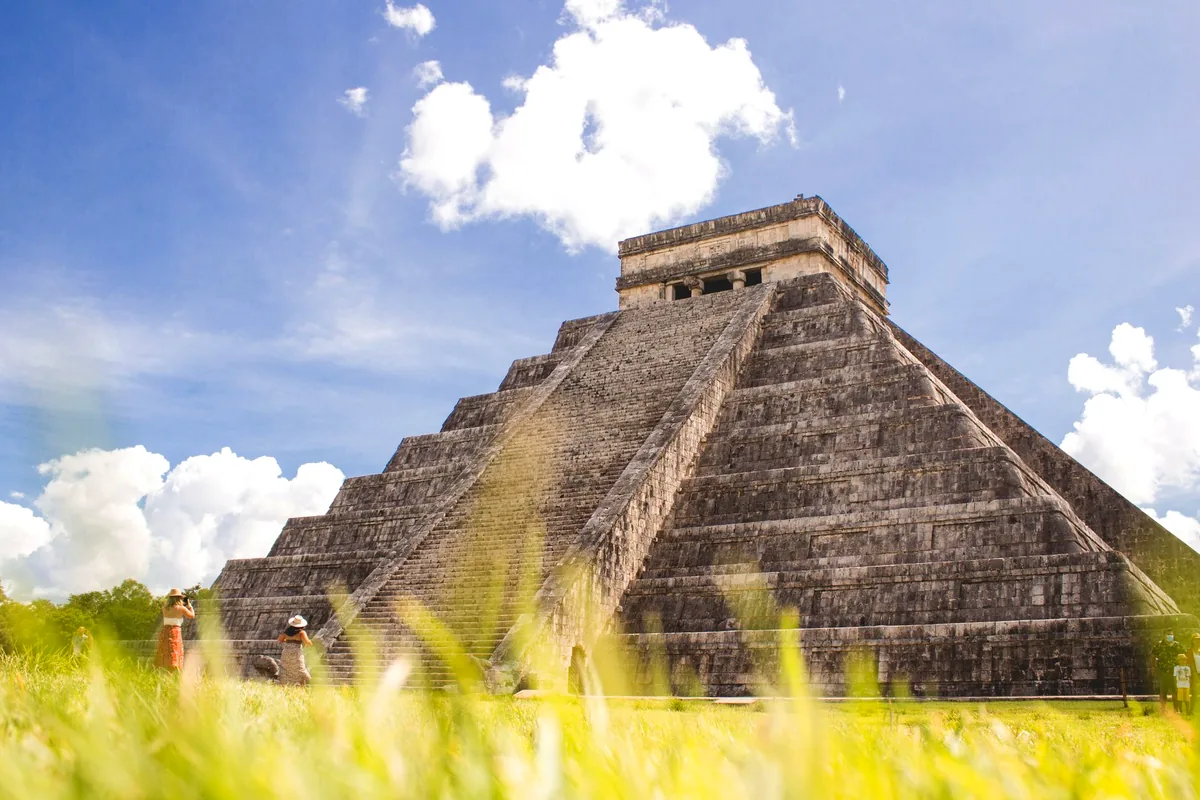 Chichen Itza El Castillo pyramid Yucatan Mexico golden hour