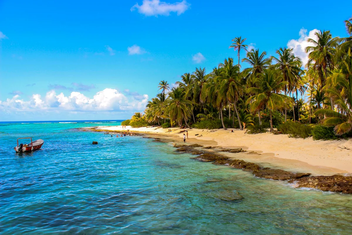 San Andres Island Colombia beach palm trees blue water panoramic