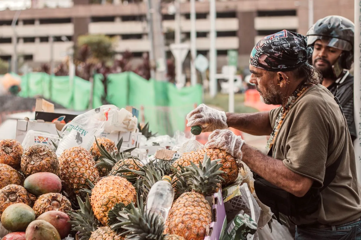 Colombian street food market Cali tropical fruits chontaduro colorful