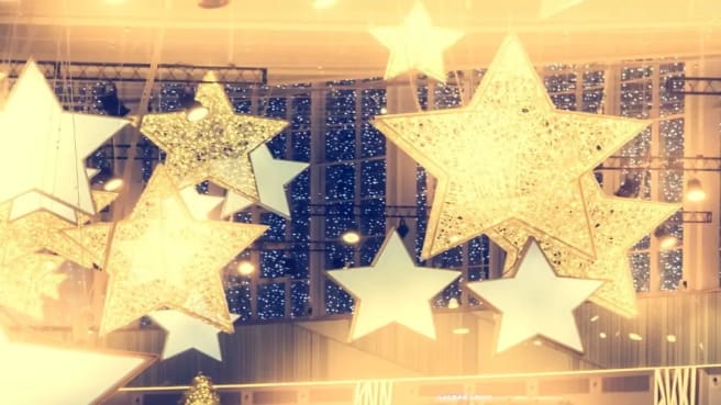 Golden stars symbolizing celebrities at a party.