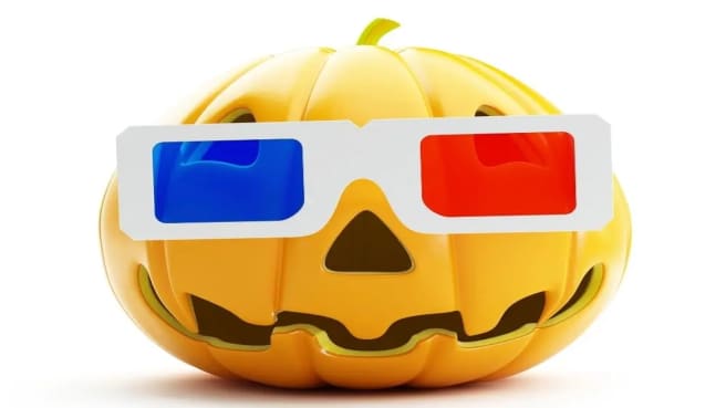 A Halloween pumpkin with movie glasses.