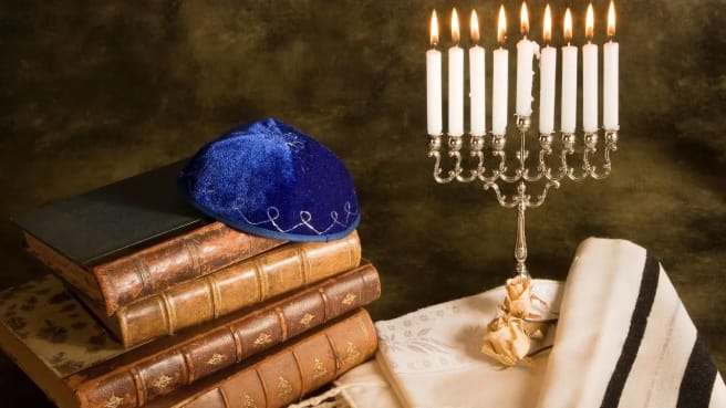 Judaism artifacts such as Kippah and Hanukkah candles.