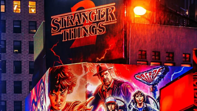 Stranger Things colorful logo with the series characters.