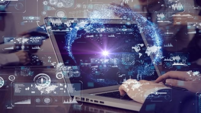 A person is typing on the computer and inventing new technology.