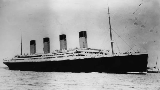 The Titanic ship in a black and white photo.