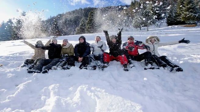 People playing in the winter's snow.