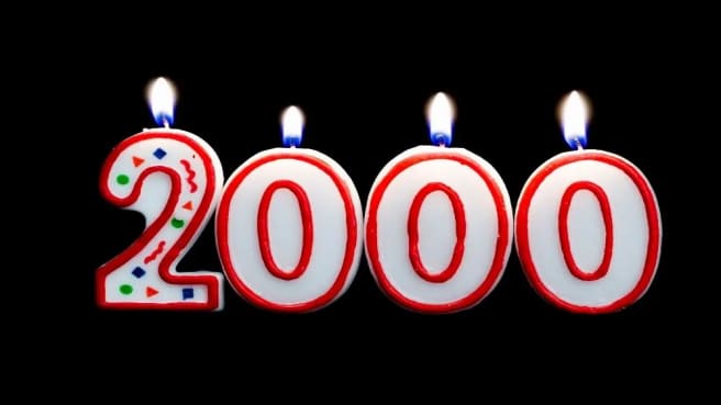 Candle lights with the number 2000.