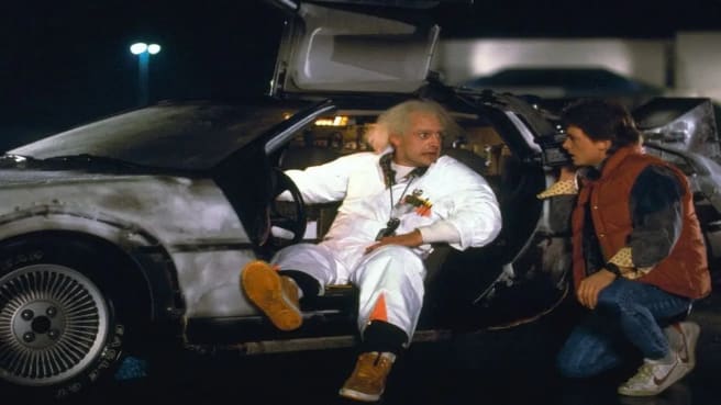 Doc Brown and Marty Mcfly on the Delorean from Back To The Future.