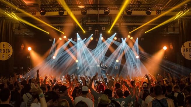 Music band on a stage during a music concert.