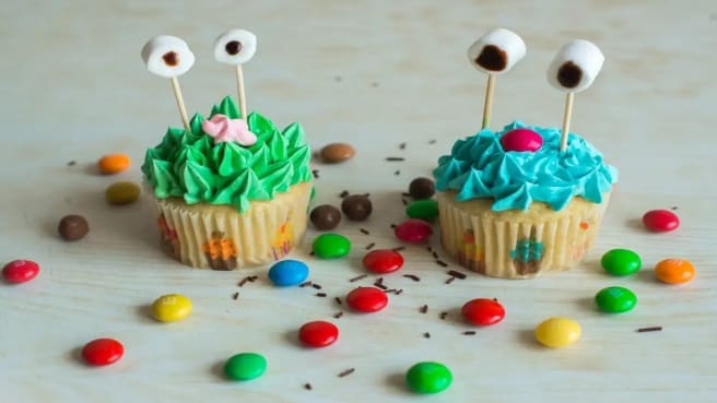 Two funny Muffins candies with faces and eyes.