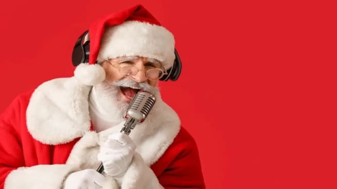 Funny Santa with glasses sings a Christmas song.