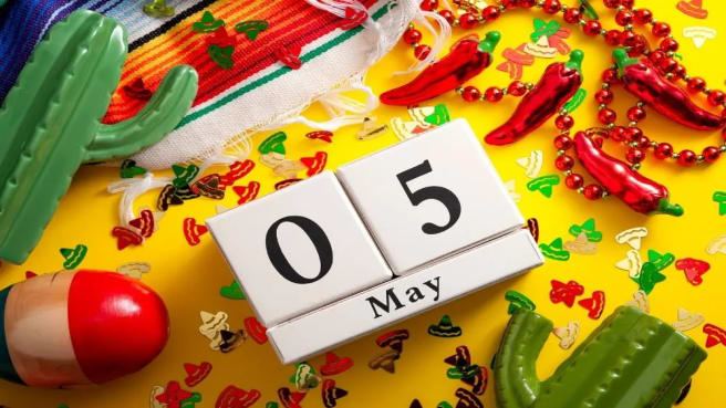 Mexcian elements with the date 5th to May on the table.