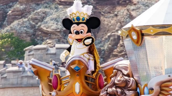 Disney's Mickey Mouse, as a king in Disneyland.