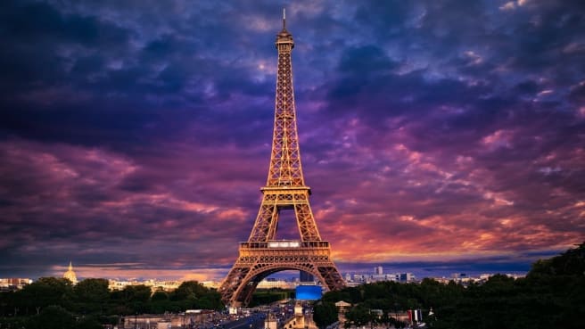 The Eiffel Tower, in Paris, at the Sunset time in France.