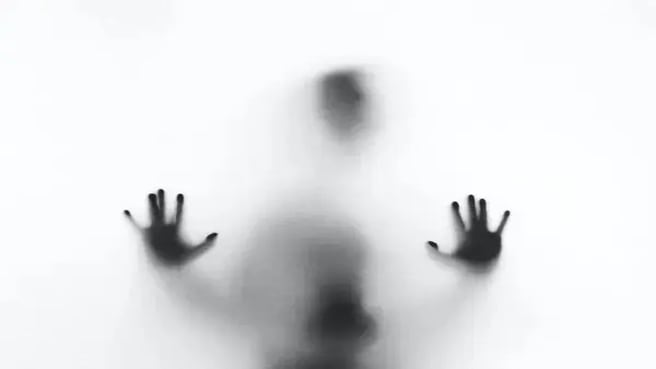 Illustration of scary horror scene of hands behind the glass.