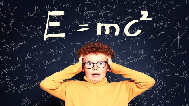 A funny kid looking at a basic math equation and answer math games that are fun.