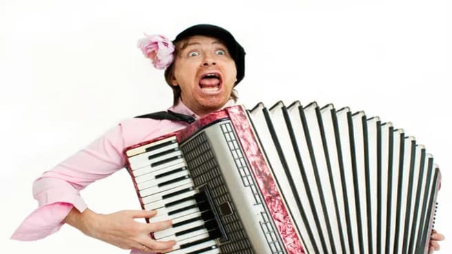 Crazy musician plays the accordion.