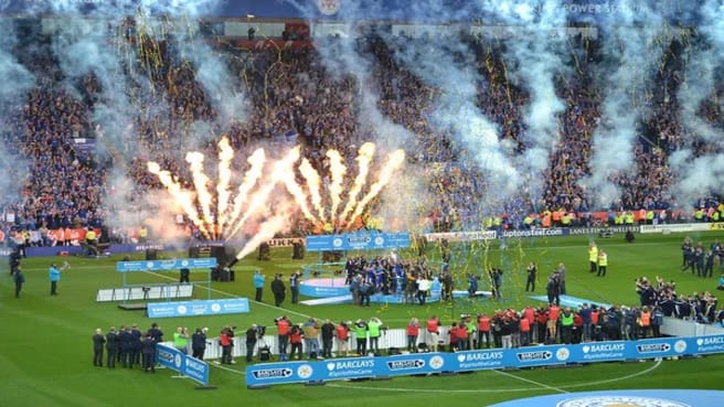 Premier League Champions celebration on the soccer court.