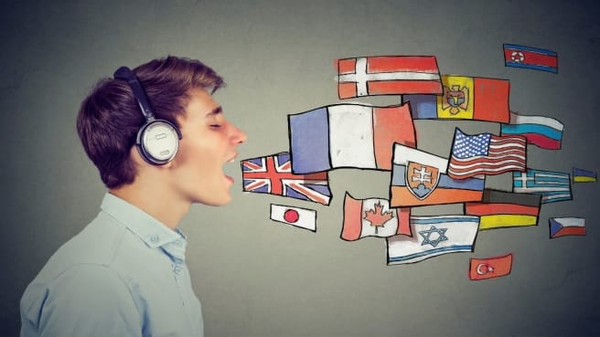 A boy sing in many languages with flags of many countries.