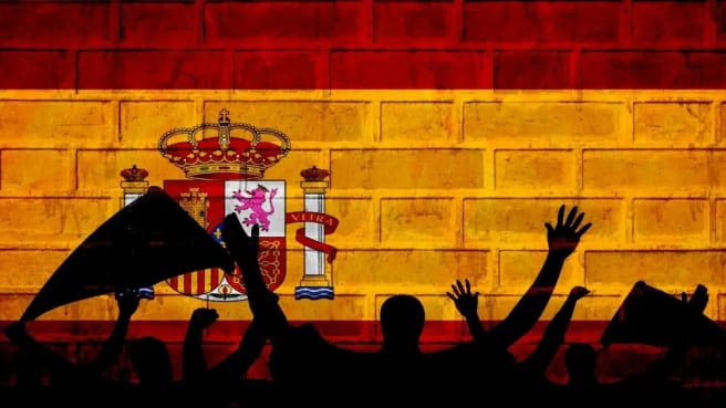 People are cheering for the Spanish flag.