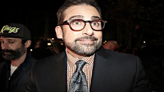 Steve Carell on the red carpet in a movie premiere.