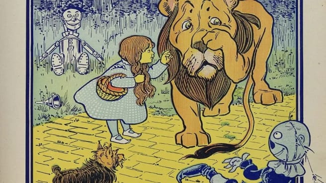 A Wizard Of Oz old post - Dorothy's on the yellow bricks with Toto and more characters.