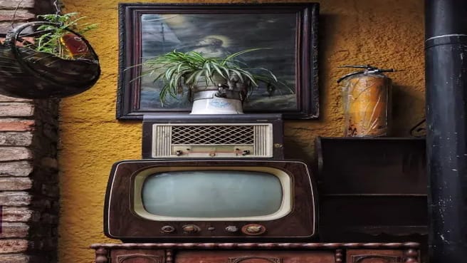 Vintage 80s decoration with an old TV.