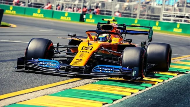 A racing yellow formula 1 car