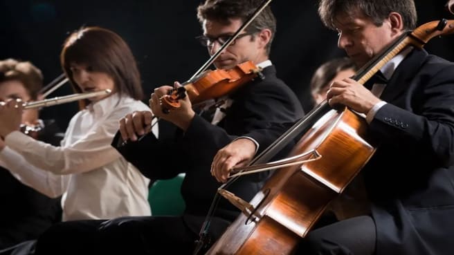 The orchestra is playing classical music.