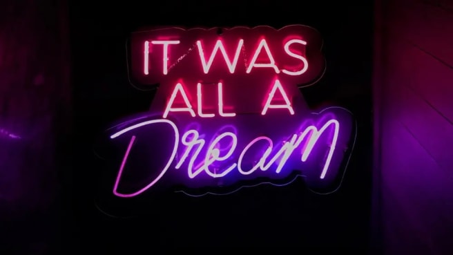 Film quote on neon lights.