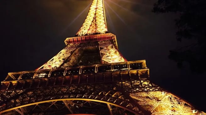 The Eiffel tower in Paris, France, at night.