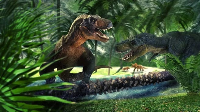 Two T-rex are fighting in Jurassic Park.