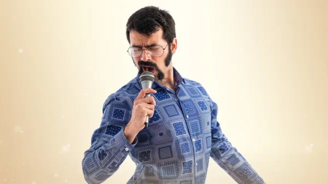 Vintage funny musician singing to the microphone.